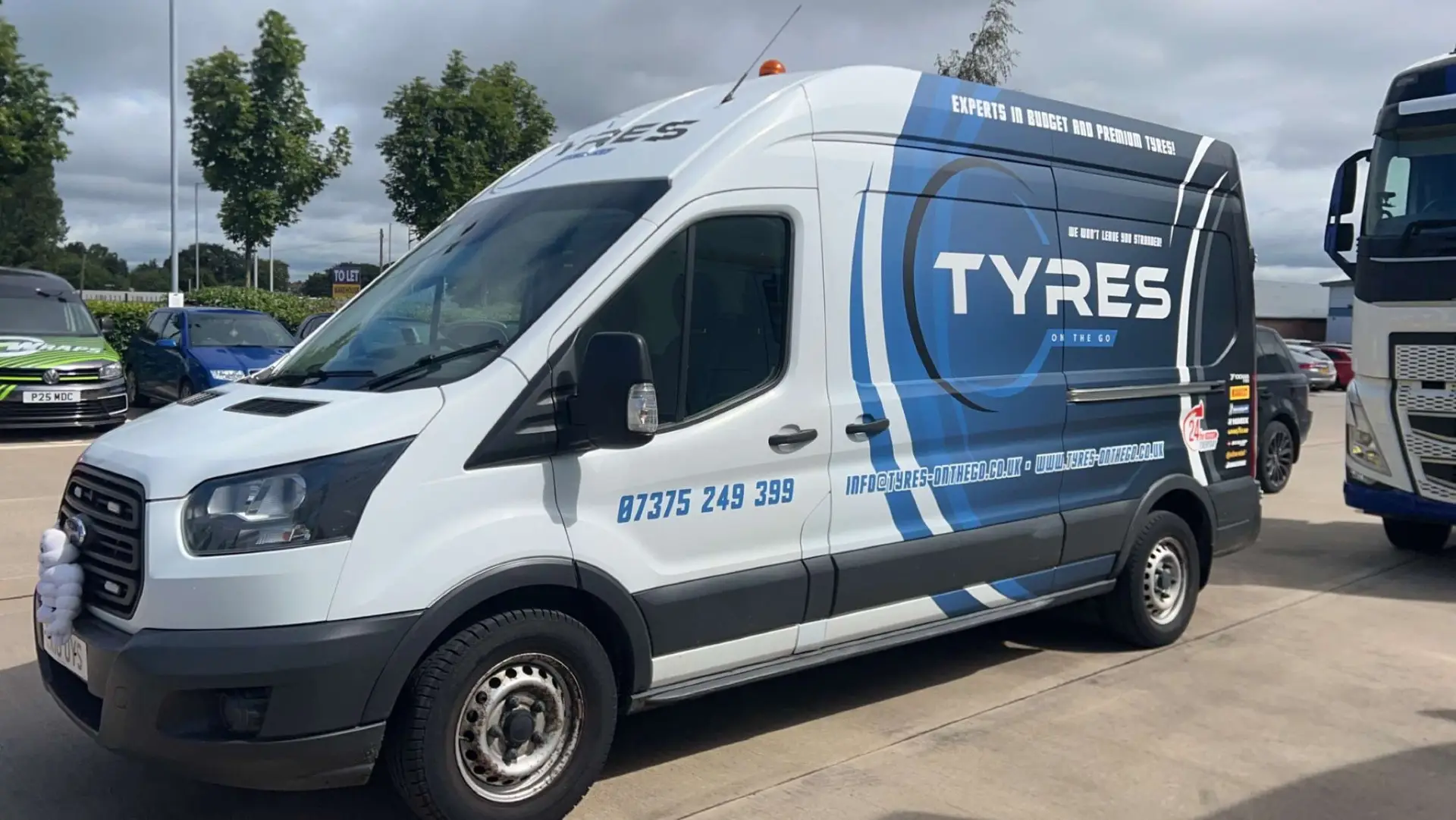 24/7 emergency mobile tyre fitting van attending a roadside call-out at night