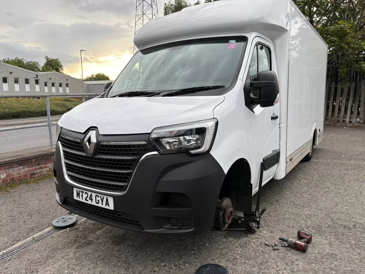 Commercial van raised for a mobile tyre replacement